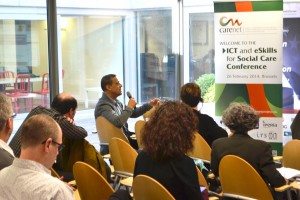 A participant adressing the panel at the conference