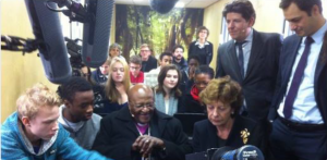 Desmond Tutu and Neelie Kroes play the game